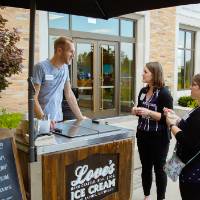 Guests getting some ice cream from Love's Ice Cream truck.
